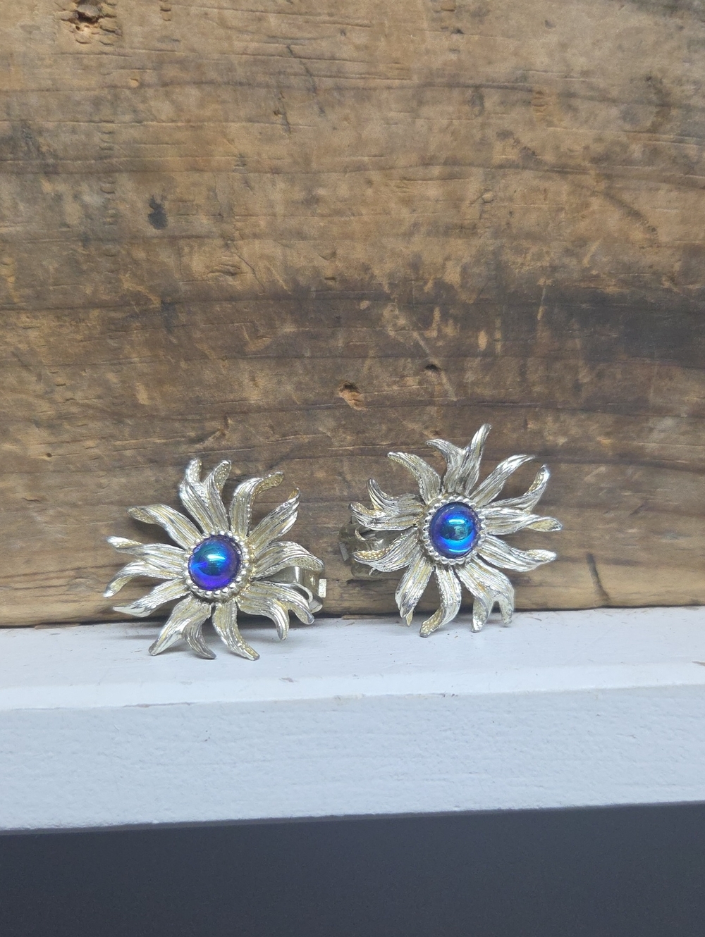 Vintage Textured Silvertone Sunburst Blue Glass Clip-On Earrings